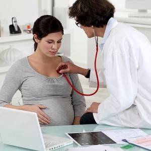 Pregnant woman at a doctor's surgery